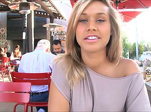Blonde cutie Kennedy flashes her shaved pussy in the cafe